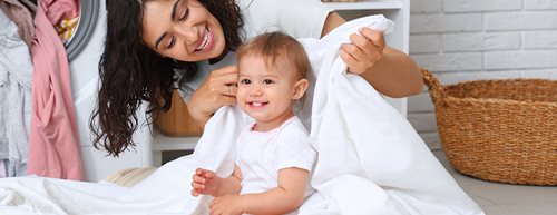 Babykleidung richtig waschen: So werden Strampler und Co. hygienisch sauber